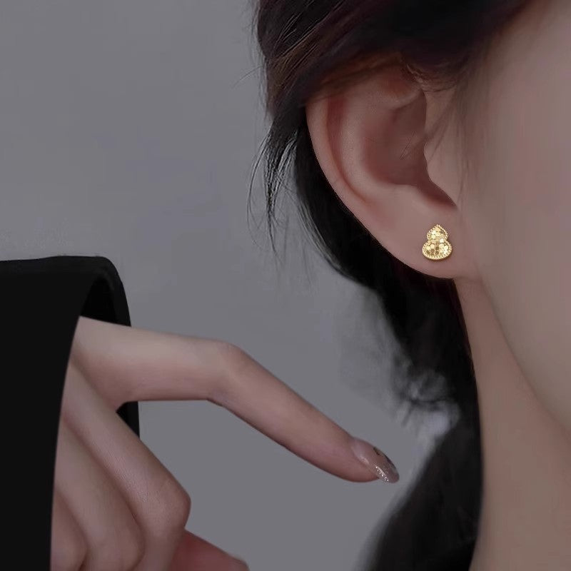 Clous d'oreilles pour femme design cœur avec accents étincelants
