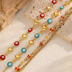 Bracelet femme avec pendentifs artistiques