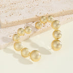 Bracelet pour femme avec perles dorées texturées