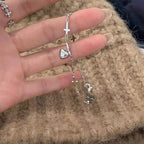 Bracelet à breloques croix et cœur