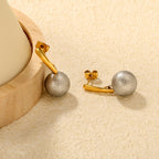 Boucles d'oreilles pendantes pour femme avec perle et finition dorée