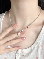 Collier avec pendentif en pierre précieuse en forme de cœur