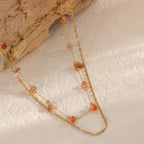 Collier pour femme avec pierres transparentes et chaîne à maillons