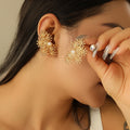 Boucles d'oreilles pour femme motif floral luxueux avec perles