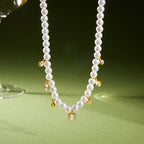 Collier pour femme avec perles et pendentifs en zircone