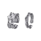 Bague ouverte pour femme au design moderne et torsadé