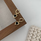 Boucles d'oreilles pendantes pour femme avec cœur et pierre noire