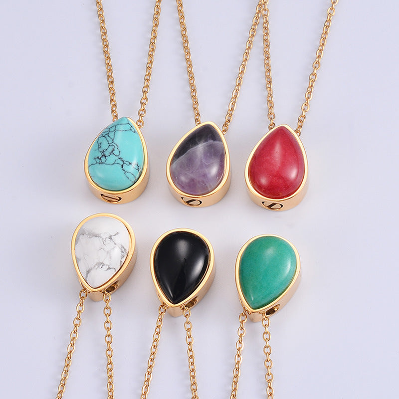 Collier doré pour femme avec pendentif goutte en pierre