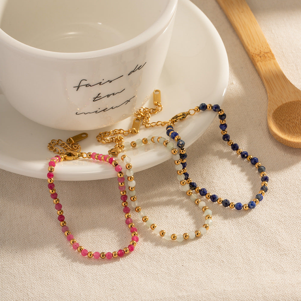 Bracelet pour femme avec cristaux scintillants et maillons dorés