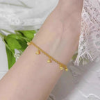 Bracelet de cheville pour femme avec breloques clochettes