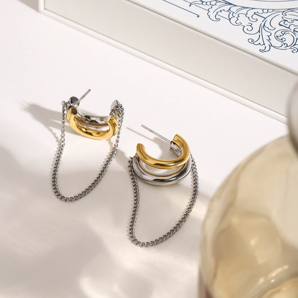 Boucles d'oreilles pendantes élégantes en acier inoxydable