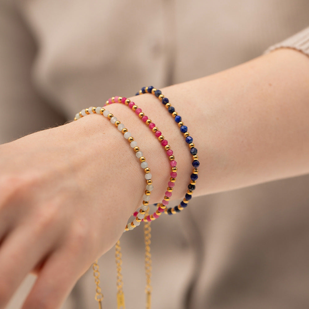 Bracelet pour femme avec cristaux scintillants et maillons dorés
