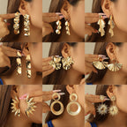 Boucles d'oreilles pendantes pour femme motif feuille