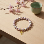 Bracelet pour femme au design floral avec accents dorés
