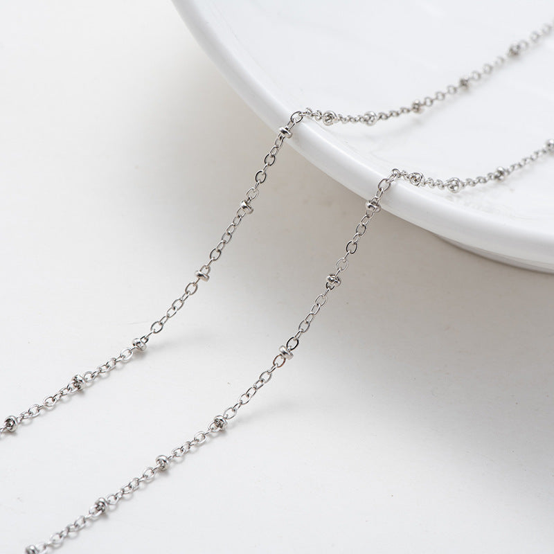 Collier délicat à perles dorées pour femme