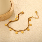 Bracelet élégant pour femme avec pendentifs ronds en acier inoxydable