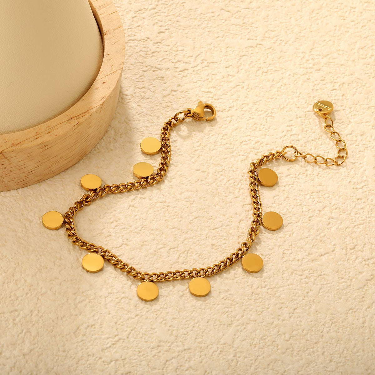 Bracelet élégant pour femme avec pendentifs ronds en acier inoxydable