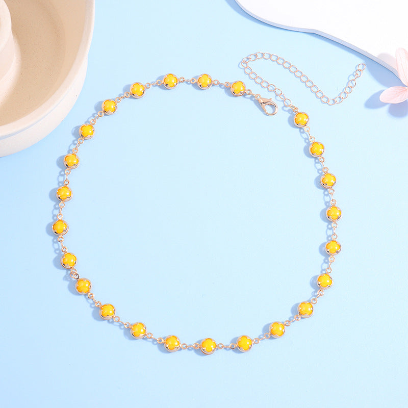 Choker à breloques florales