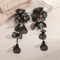 Boucles d'oreilles pendantes pour femme motif floral