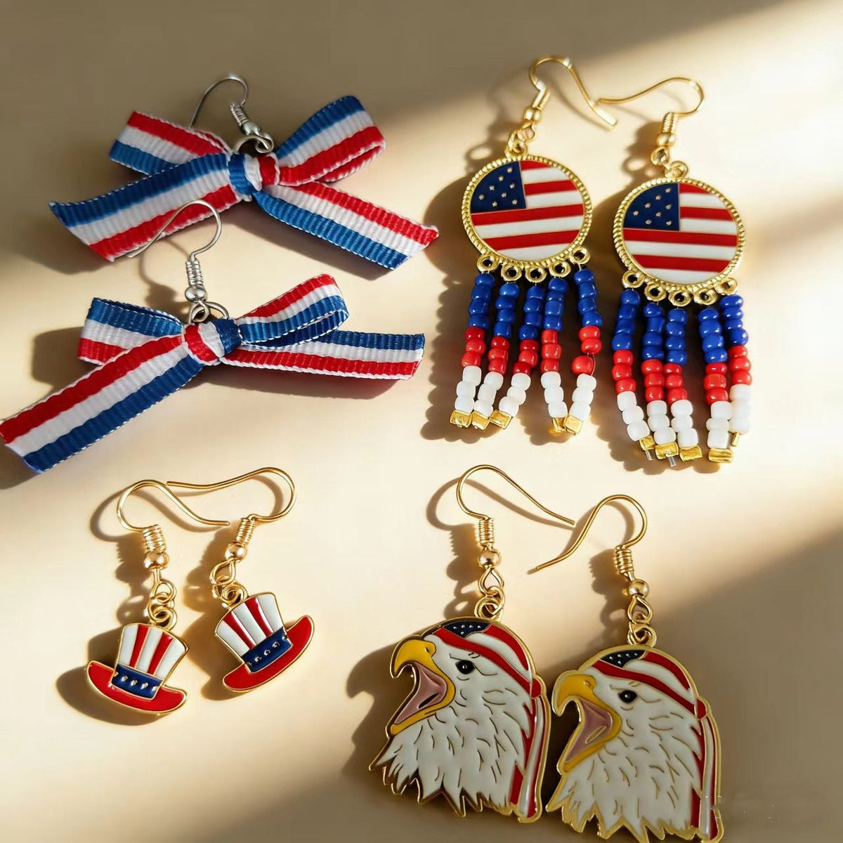 Boucles d'oreilles pendantes nœud en ruban gros-grain