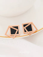 Boucles d'oreilles géométriques superposées pour femme
