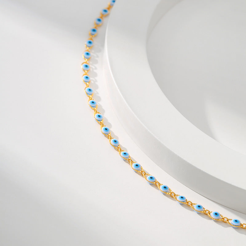 Collier charme œil