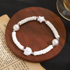 Bracelet de perles pour femme avec motif coquillage classique