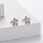 Boucles d'oreilles puces en forme de fleur avec zirconiums