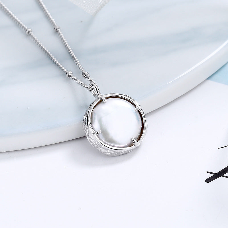Collier pour femme avec pendentif coquillage