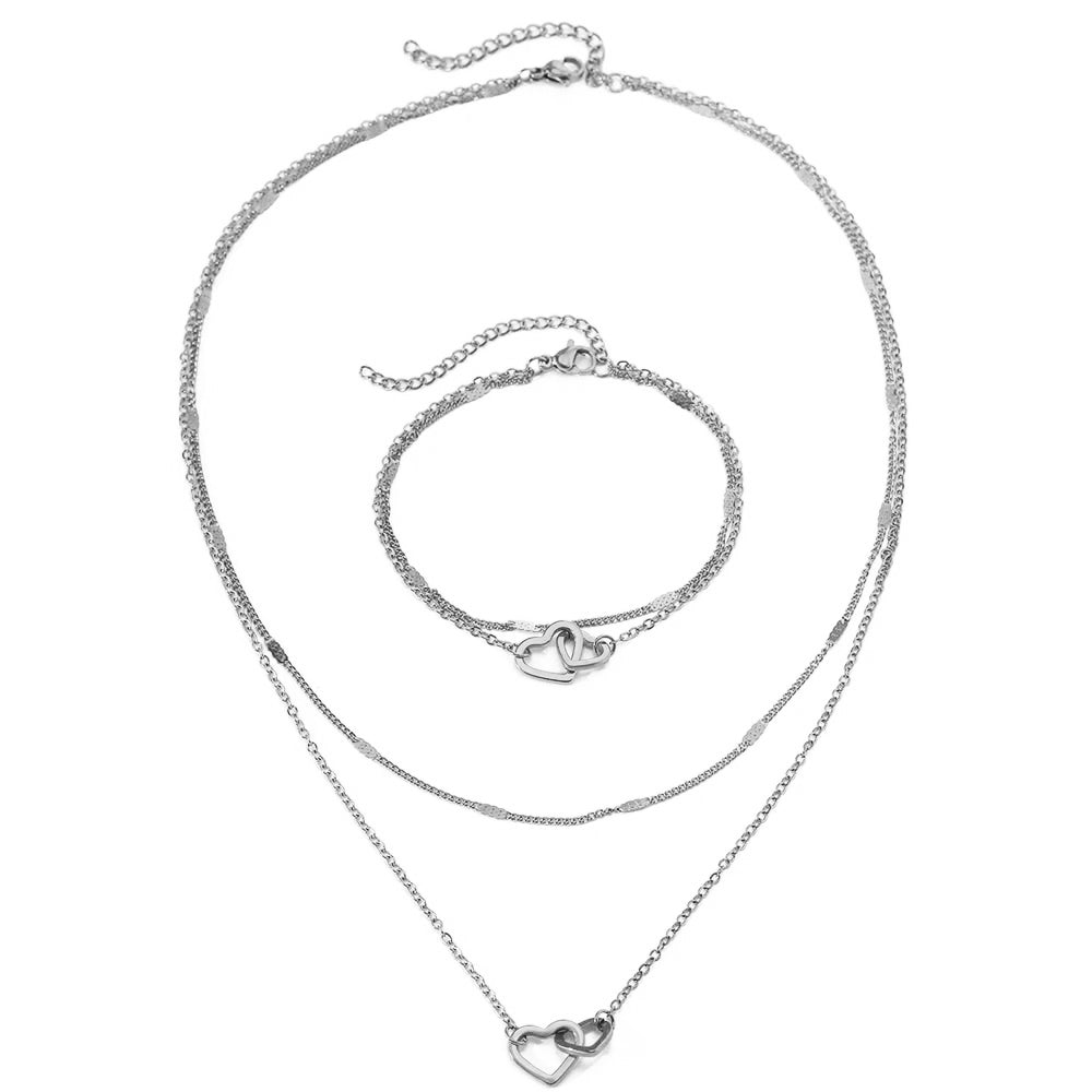 Parure collier et bracelet cœurs entrelacés