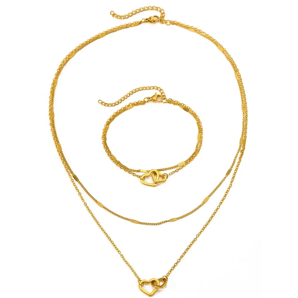 Parure collier et bracelet cœurs entrelacés