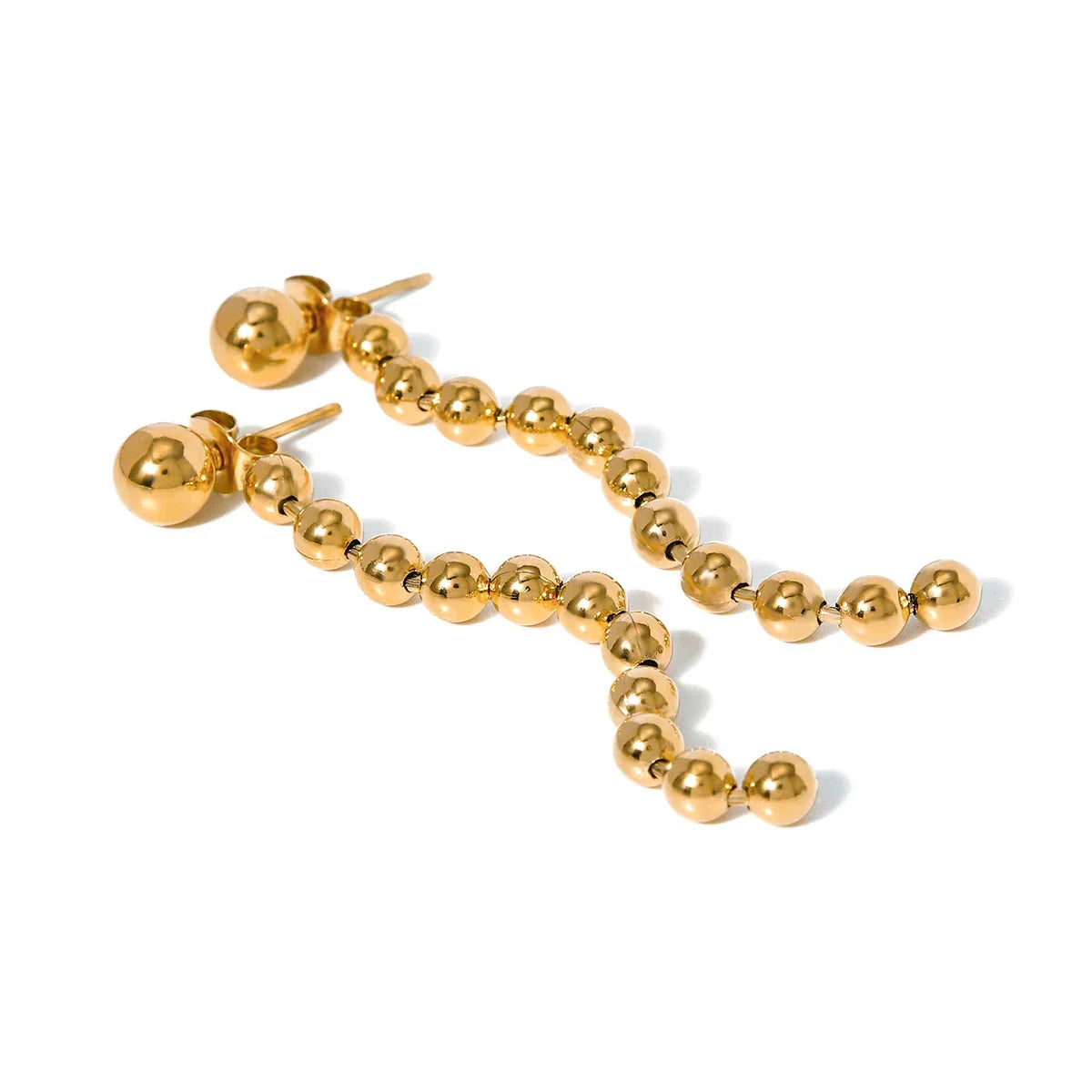Boucles d'oreilles pompons perles dorées
