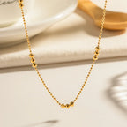 Collier délicat à trois perles 16 carats