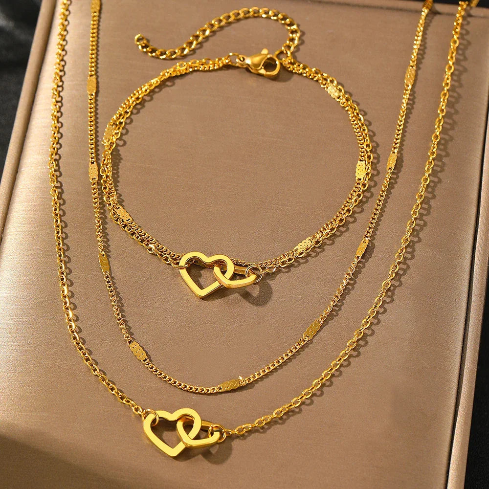Parure collier et bracelet cœurs entrelacés