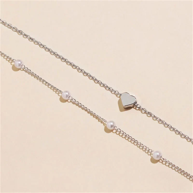 Collier ras-du-cou perles et cœur pour femme