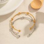 Bracelet jonc élégant à sphères