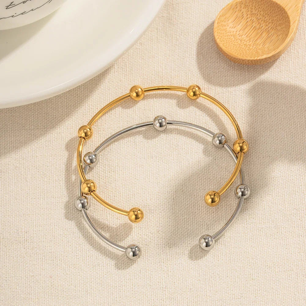 Bracelet jonc élégant à sphères
