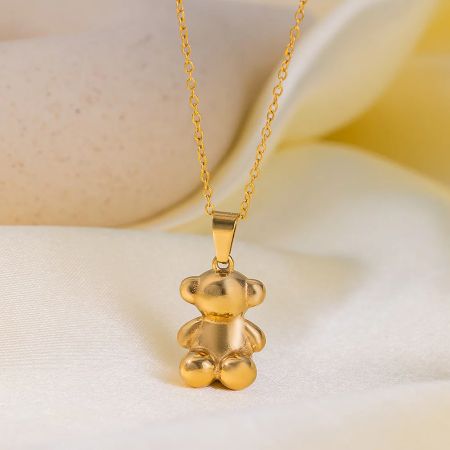 Ensemble collier et boucles d'oreilles ours