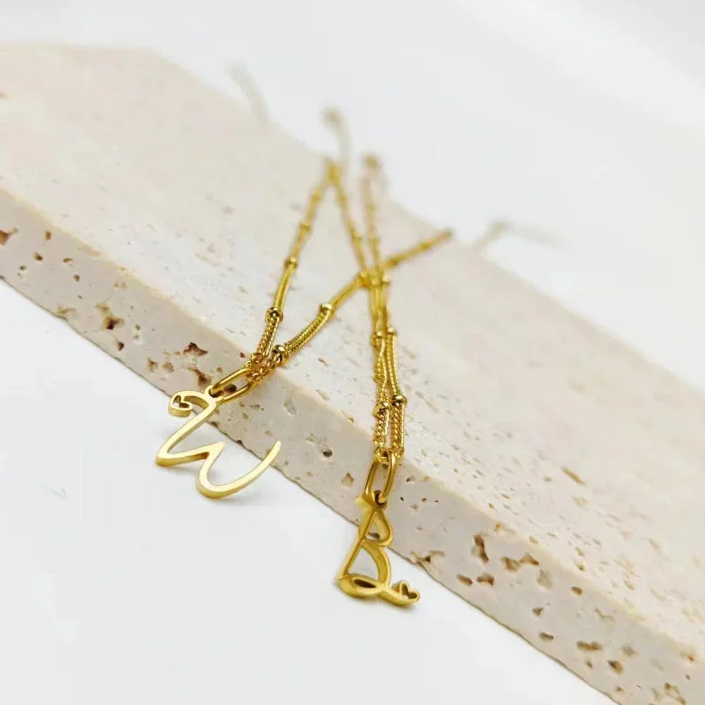 Collier initiale cœur et chaîne satellite