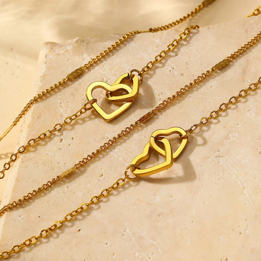 Parure collier et bracelet cœurs entrelacés