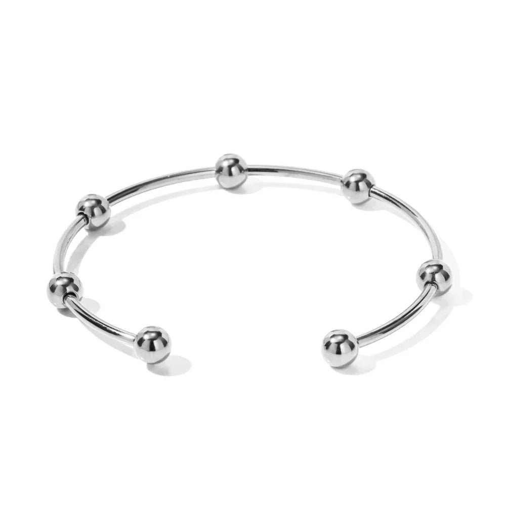 Bracelet jonc élégant à sphères