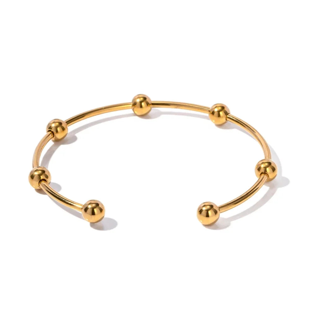 Bracelet jonc élégant à sphères