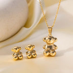 Ensemble collier et boucles d'oreilles ours