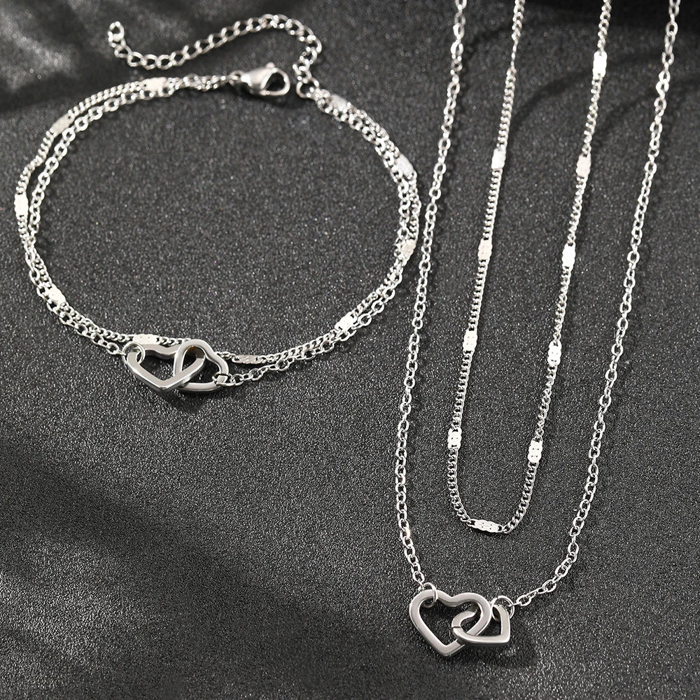 Parure collier et bracelet cœurs entrelacés