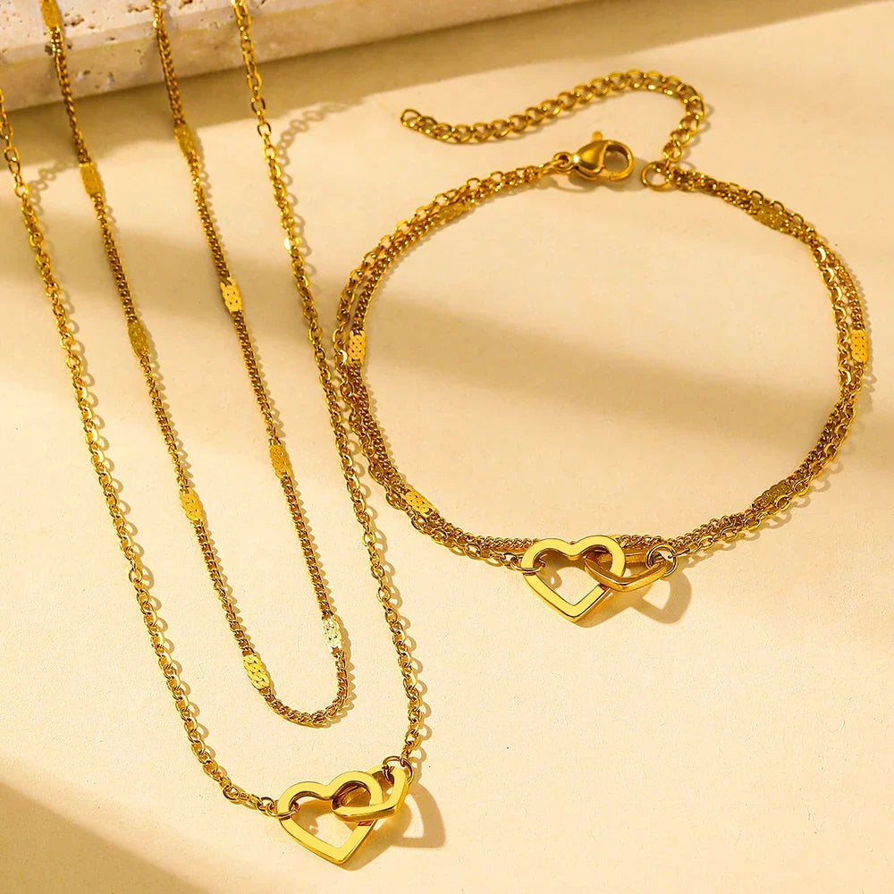 Parure collier et bracelet cœurs entrelacés