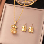 Ensemble collier et boucles d'oreilles ours