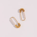 Boucles d'oreilles épingle à nourrice perle 18k