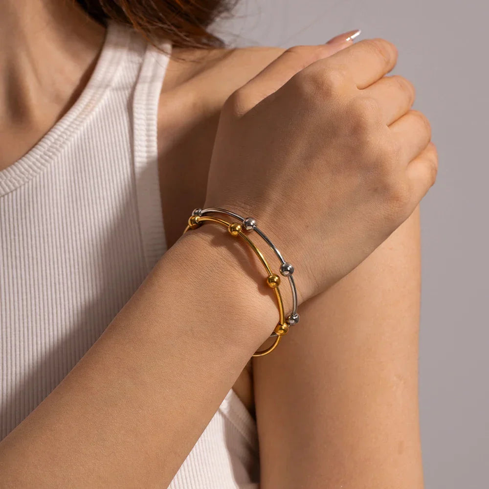 Bracelet jonc élégant à sphères