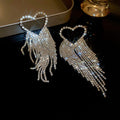 Boucles d'oreilles longues à pampilles et faux diamants