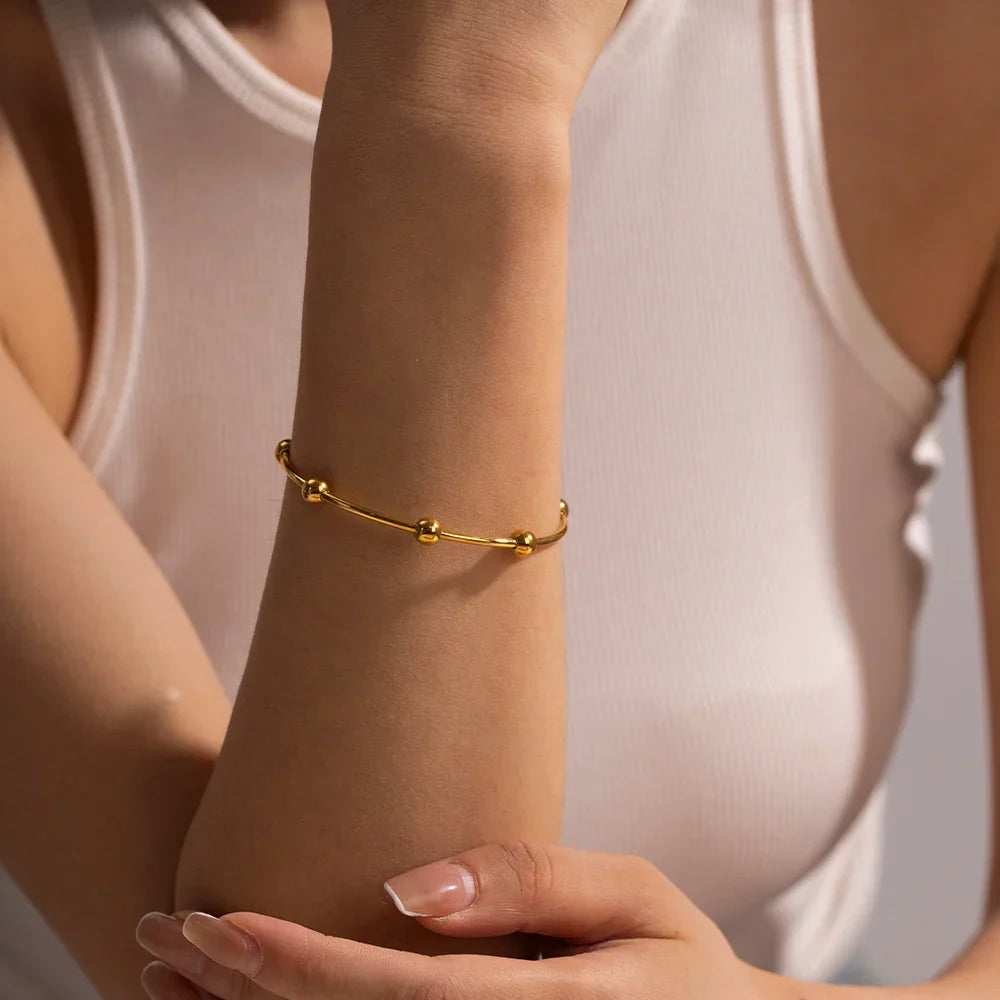 Bracelet jonc élégant à sphères